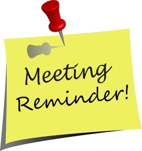 sticky note with red pin saying meeting reminder
